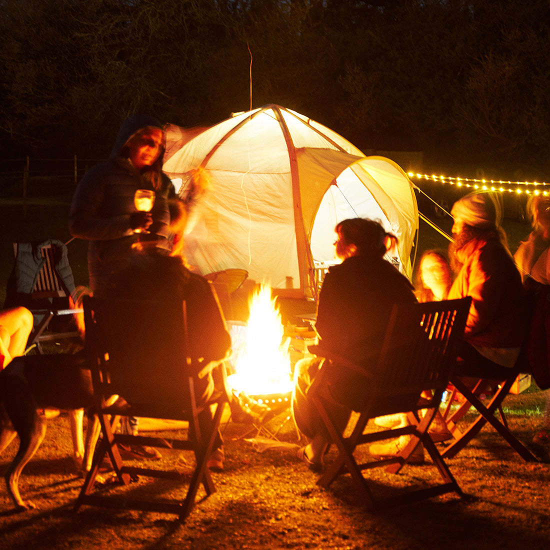 campfire family fun with nova air dome tent in the background