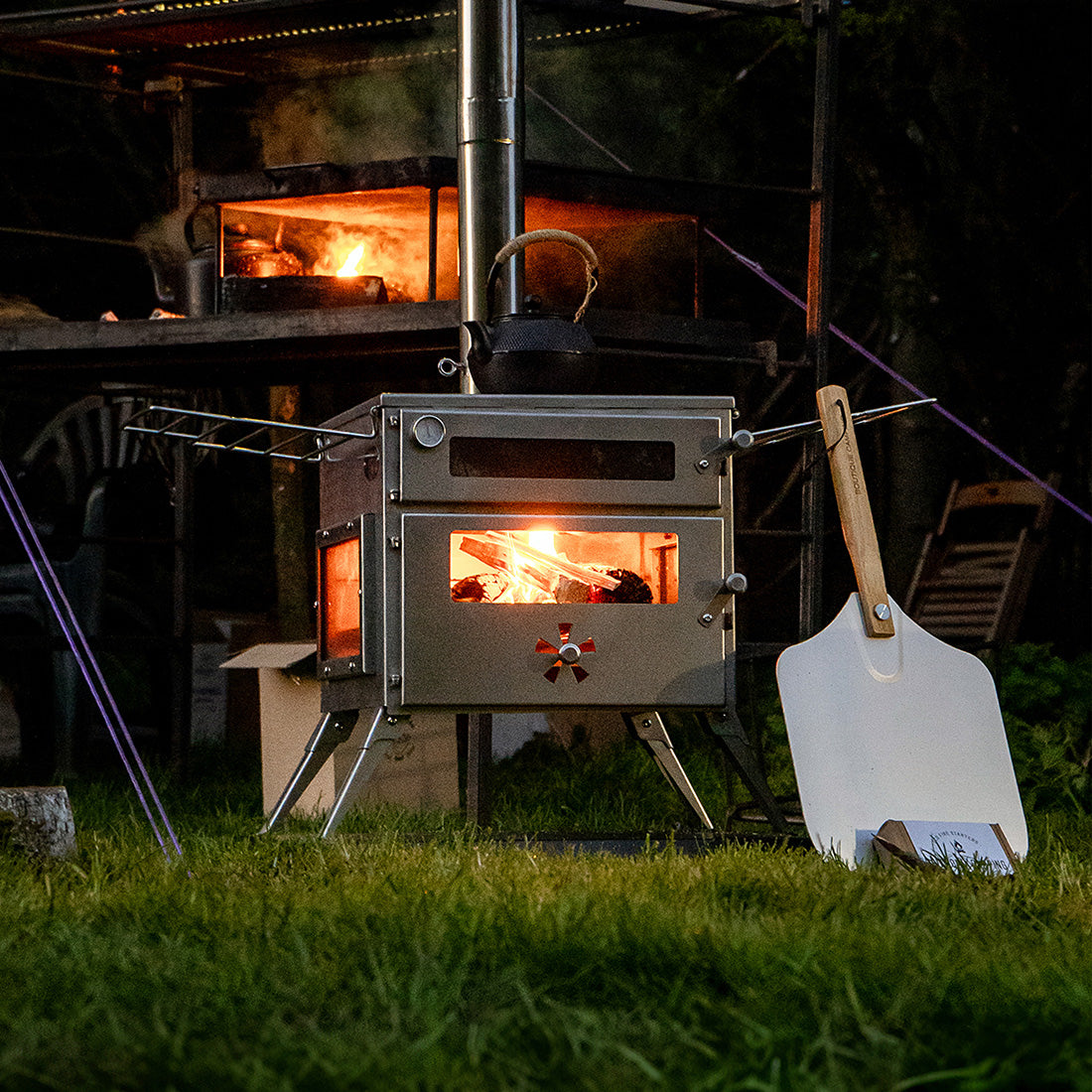 alfresco dining with boutique camping pizza oven plus and shovel