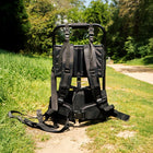 bell tent backpack by boutique camping on a grassy pathway