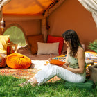 Vela Air Tent with cosy outdoor seating and boho chic design – Luxury glamping tent by Boutique Camping