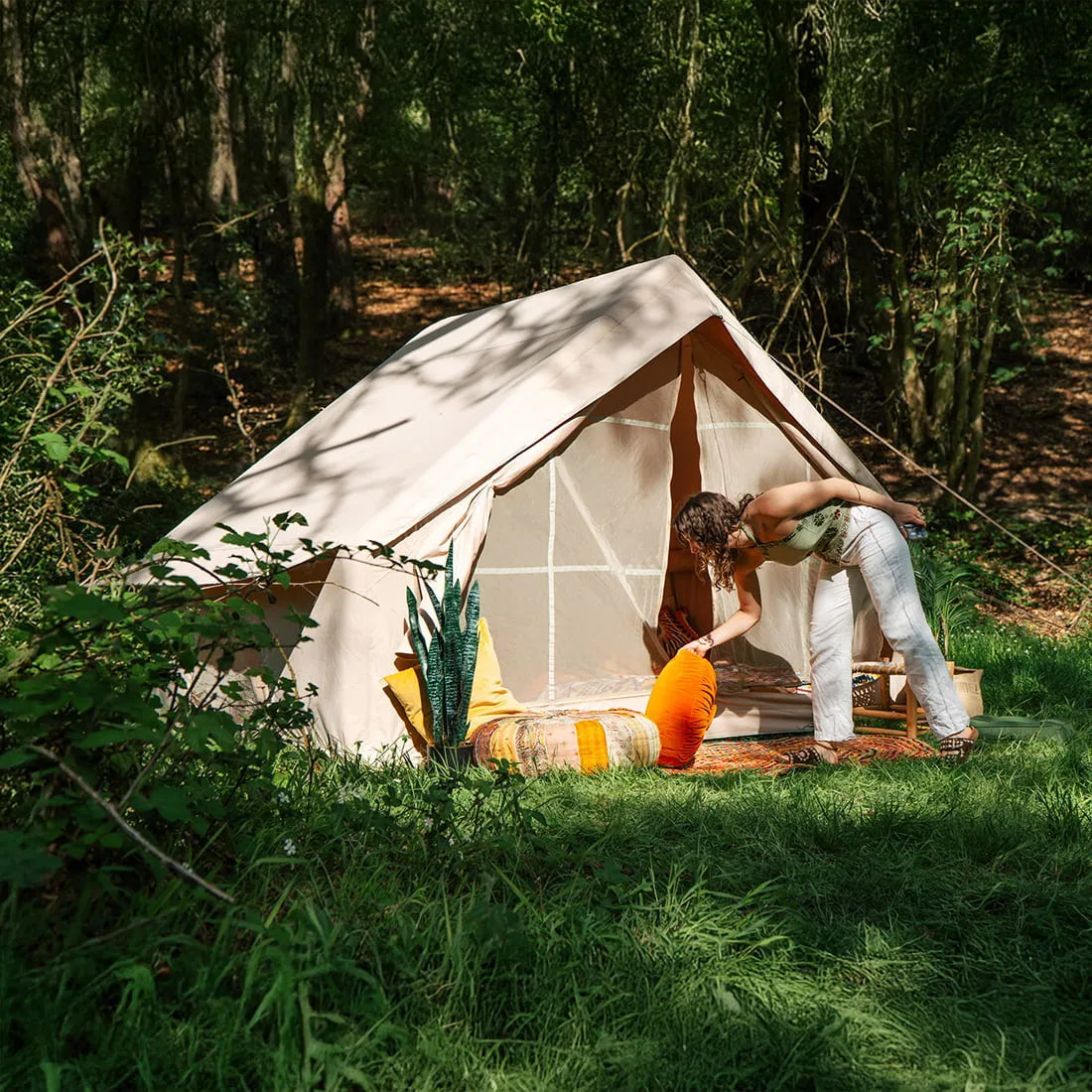 Vela Air Tent featuring a bohemian interior and scenic outdoor setting – Boutique Camping luxury glamping experience