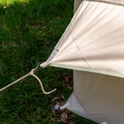Close-up of the Vela Air Tent’s secure tie-down rope and reinforced stitching detail.