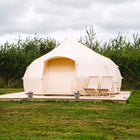 boutique camping 5m luna bell tent in a field on decking