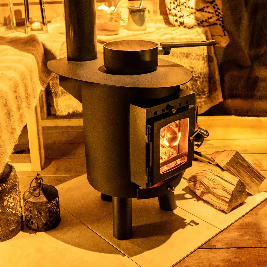 glamping wood burning stove boutique camping cabin shepards outbacker