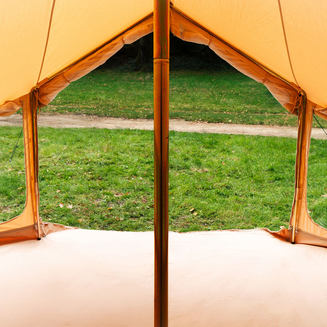 Bell Tent Pro tent interior showing breathable cotton canvas and center pole
