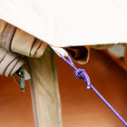 close up of bell tent pro tent's purple guy rope