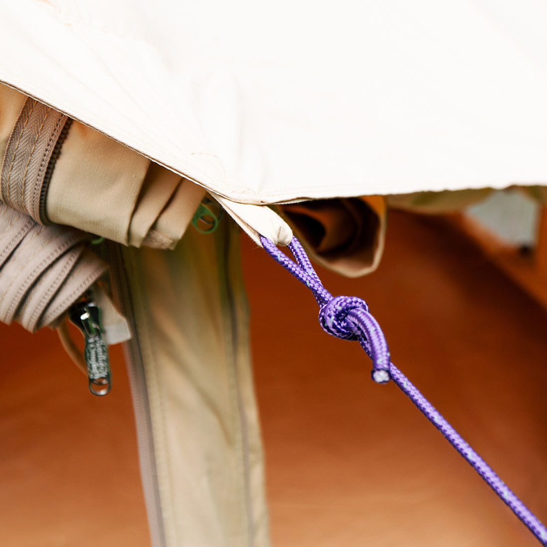 close up of bell tent pro tent's purple guy rope