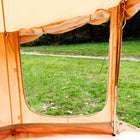 Bell Tent Pro internal view of open side window showing green grassy field 