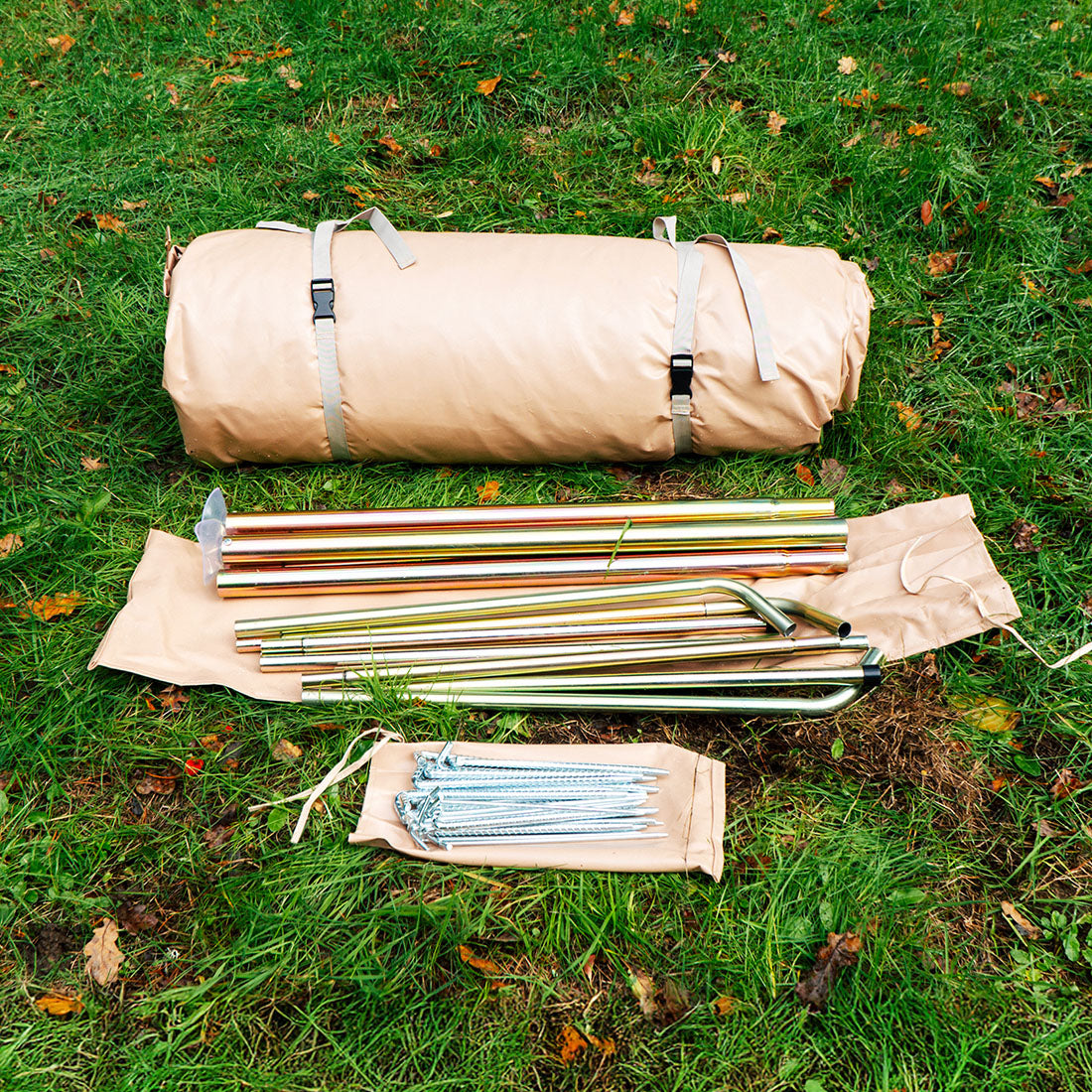 Bell Tent Pro components laid out on grass