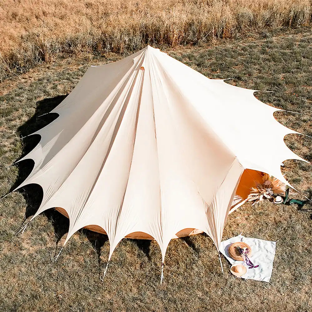 Bell tent plus glamping tent aerial top down view outdoor setup