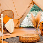 Bell tent plus glamping tent interior lifestyle setup with furnishings