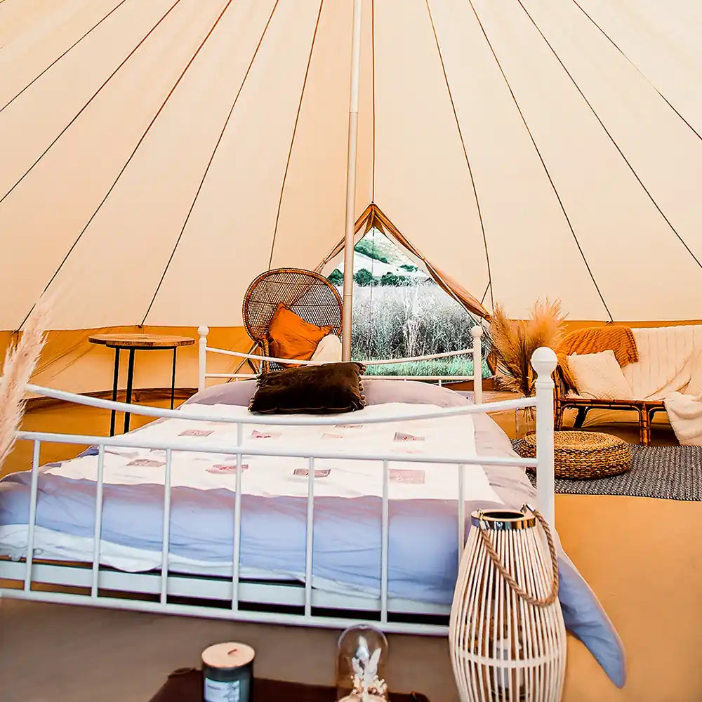 Bell tent plus glamping tent interior lifestyle view with furnishings