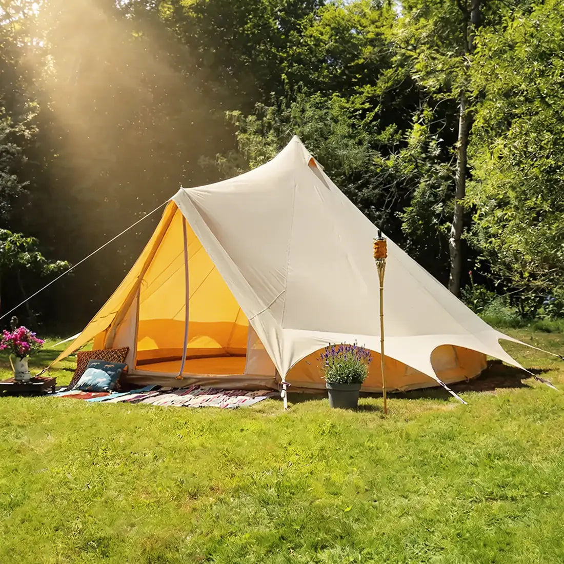 Bell tent plus glamping tent side view in garden setup