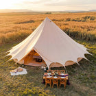 Bell tent plus glamping tent aerial view at sunset outdoor setup