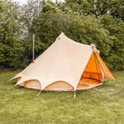 boutique camping bell tent plus fire retardant with stove flue side view in grassy field