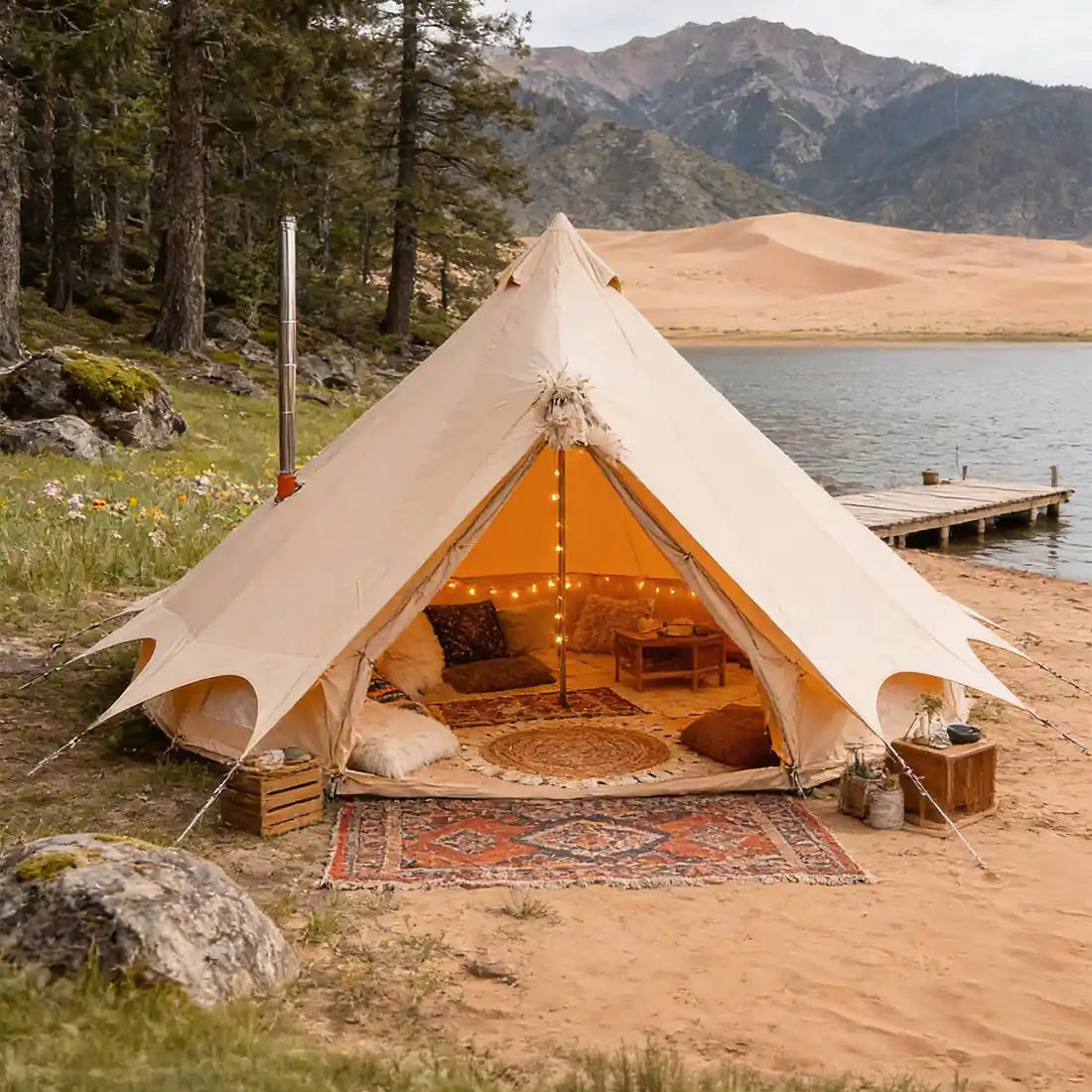 boutique camping bell tent plus with interior decor by a lake and mountains
