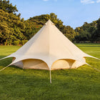 boutique camping star bell tent pitched on grass view from the back rear