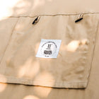 close up of boutique camping stove hole flap with hole in cotton fire retardant tent