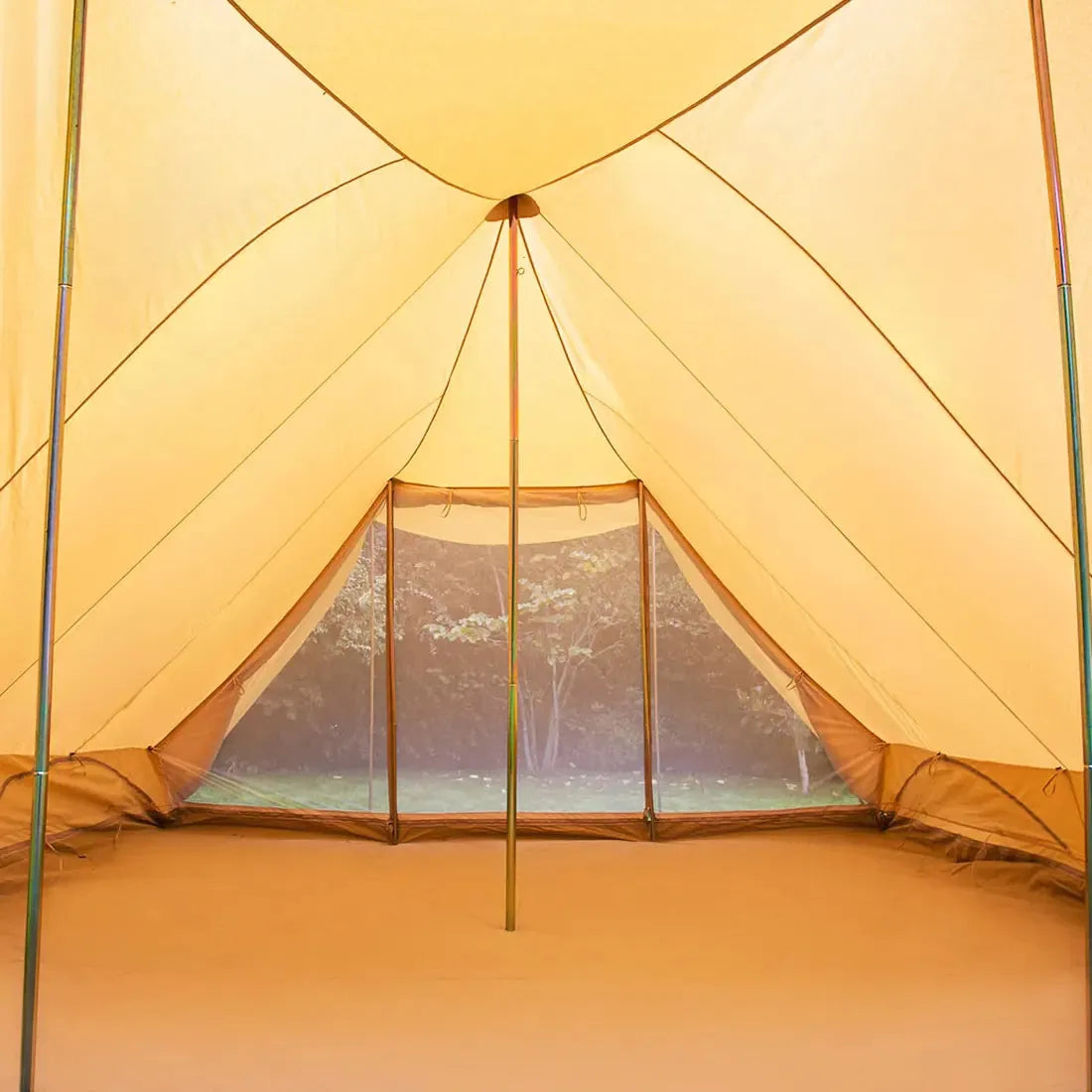 inside view of boutique camping tucana tent with a mesh window, showing a natural shadow landscape outside 