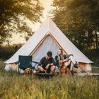 Boutique Camping Bell Tent Couple with Dogs Camping