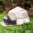 stellar festival tent with a dog and a man outside the boutique camping tent