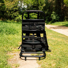 boutique camping bell tent backpack on a grassy pathway 
