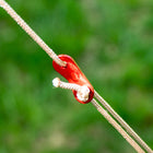 close up shot of red guy rope attachment