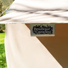 close up view of the boutique camping logo label attached to the vela air tent