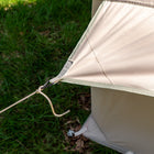  Close-up of the Vela Air Tent’s secure tie-down rope and reinforced stitching detail.