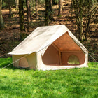 Side view of the Vela Air Tent pitched outdoors, showing the large open door and durable fabric structure.