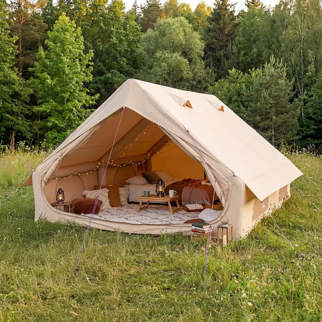 boutique camping inflatable vela air tent in double door glamping set up with fairy lights